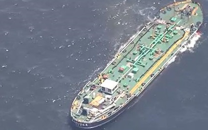 Two tankers collided off Japan, one partially sank; Oil leak reported