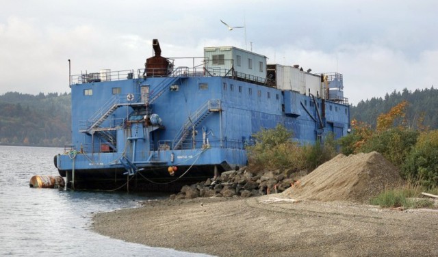 4,000-ton food-processing barge breaks free in windstorm, drifts across inlet