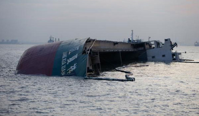 The general cargo ship Jiang Xia Xiang capsized after collision with tanker BAI CHI in Yangtze river on July 23