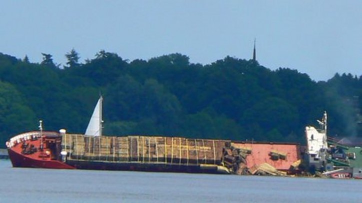 Freighter Lists, Spills Cargo, Then Strikes Dock