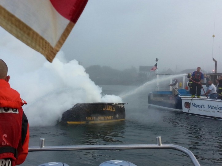 U.S. Coast Guard fights boat fire in Jonesport, Maine