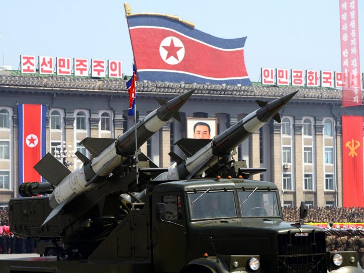 Missiles are taken on trucks past a stand with North Korean leader Kim Jong Un during the parade celebrating the 70th anniversary of the founding of the ruling Workers' Party of Korea, in Pyongyang October 10, 2015. 