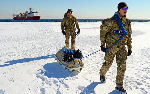 L/Cpl Ben Roberts (front) and Marine Luke Bright trekking from HMS Protector