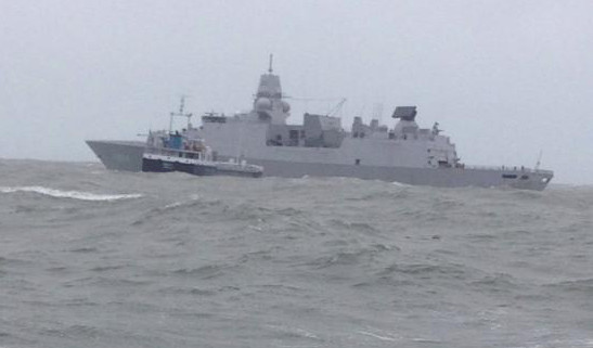 Dutch Frigate HNLMS De Ruyter arrives on scene at the request of the Coastguard to manage the tow of drifting cargo ship Verity off North Devon coast.