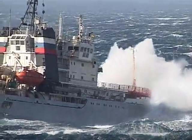 Heavy weather tugboat effort to take a Russian aircraft carrier under tow