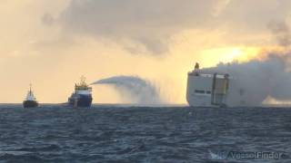Dutch authorities delay plan to tow burning cargo ship