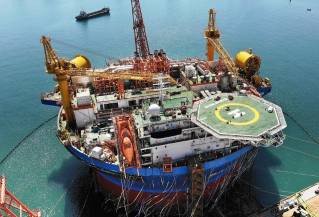 China's self-developed cylindrical floating oil production facility installed at sea