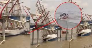 WATCH: Tall ship CISNE BRANCO collided with bridge, capsized tug at Guayaquil